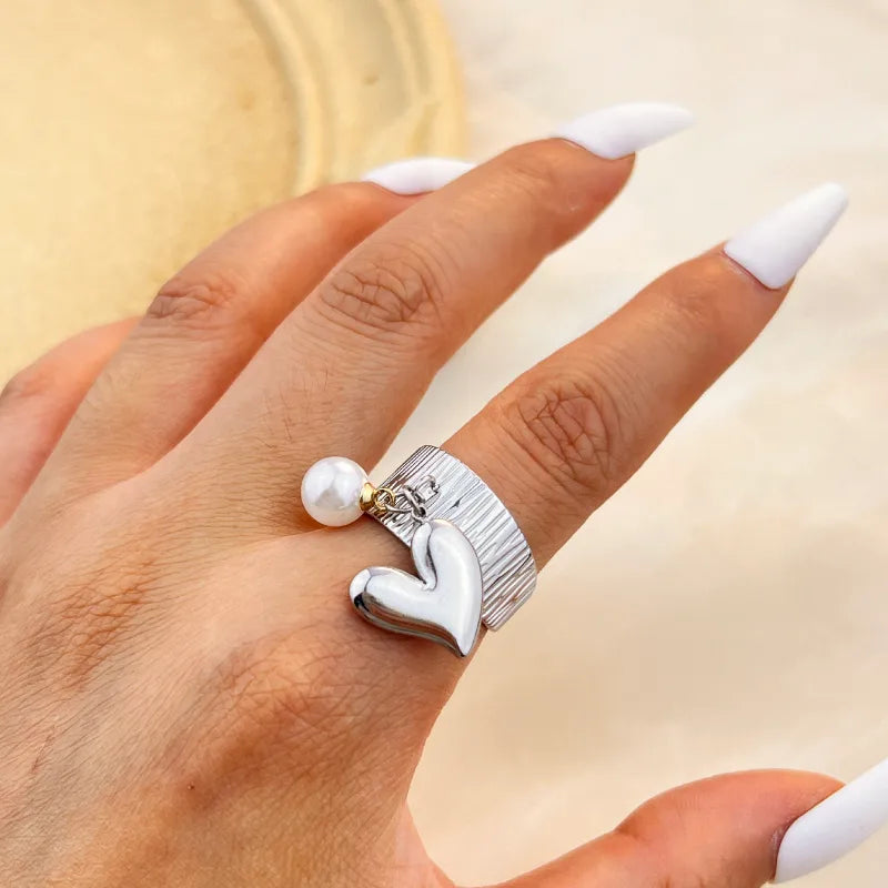 Anillo corazón colgante