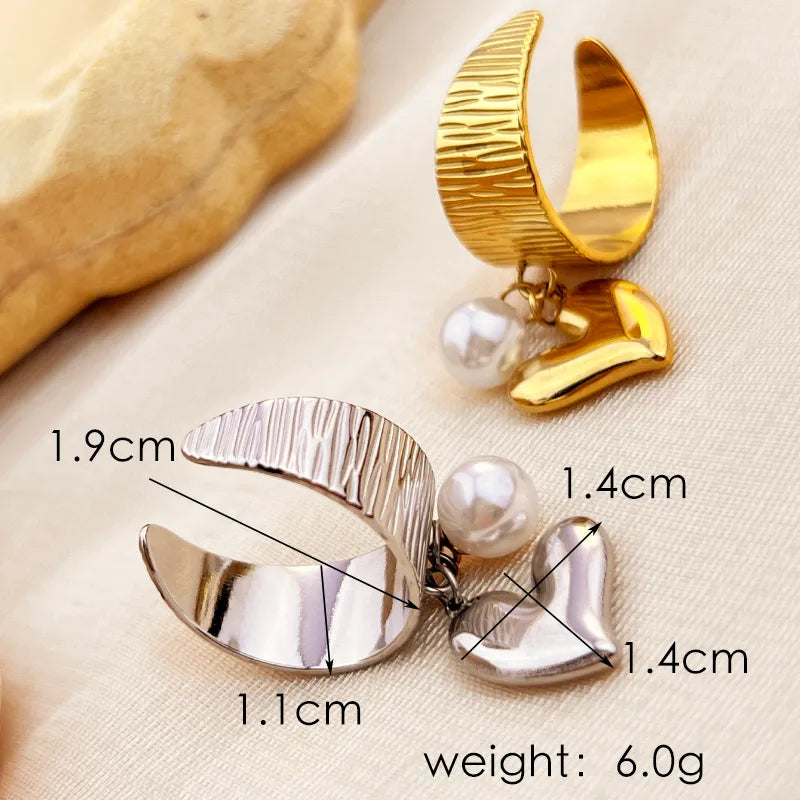 Anillo corazón colgante
