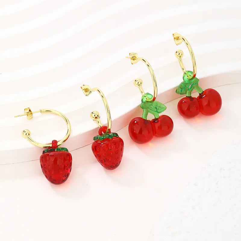 Aretes fruta resina