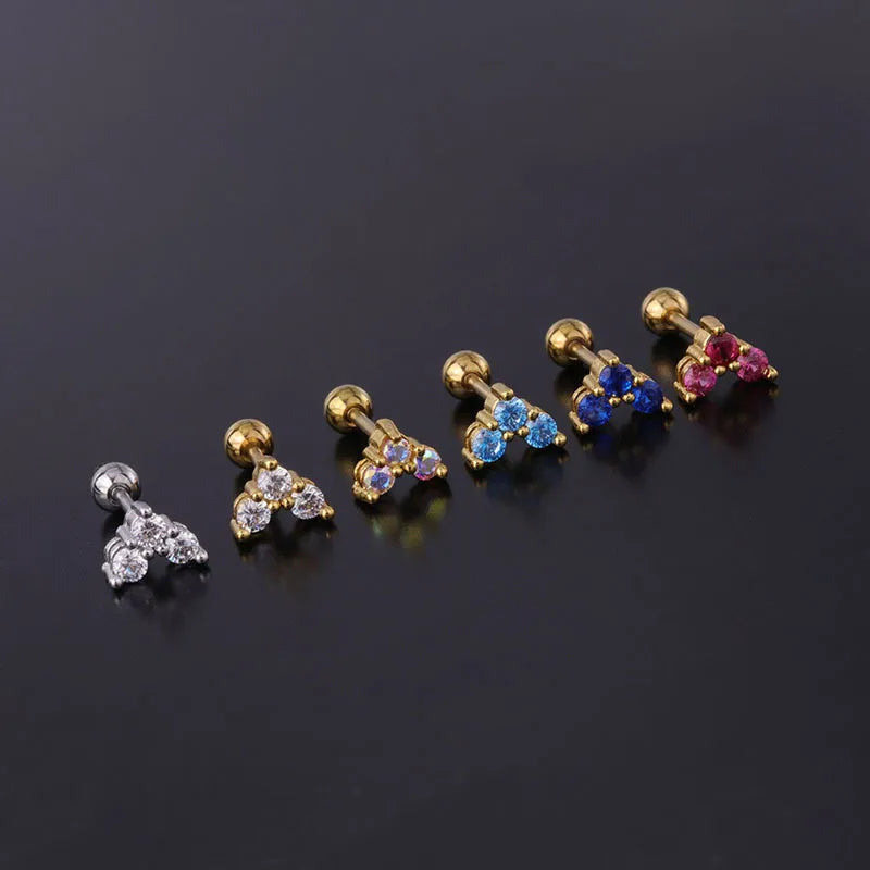 Piercing corazón piedras preciosas