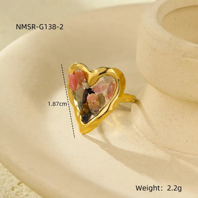 Anillo forma de corazón piedras