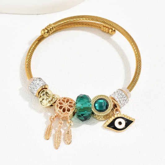 Brazalete ojo plumas